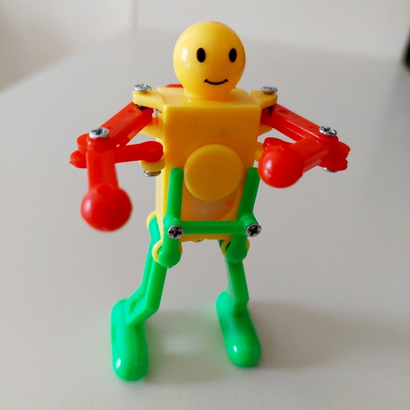3.5" Fun Wind-up Dancing Walking Robot Toy Red Green and Yellow. Makes a great - Picture 1 of 11